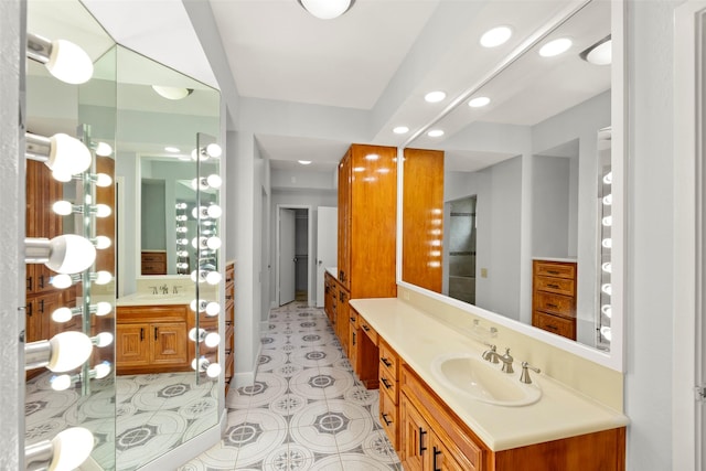 12203 Ashley Circle Dr E, Houston, TX 77071 - full bathroom with recessed lighting, two vanities, and tile patterned floors