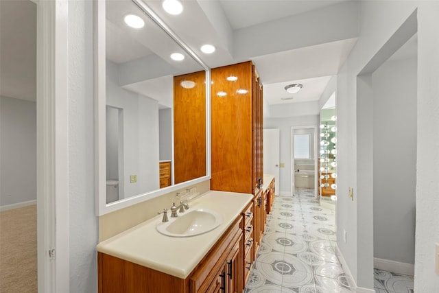 12203 Ashley Circle Dr E, Houston, TX 77071 - bathroom with vanity, baseboards, and recessed lighting