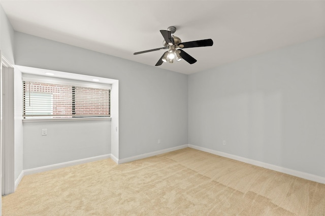 12203 Ashley Circle Dr E, Houston, TX 77071 - unfurnished room with carpet floors, ceiling fan, and baseboards
