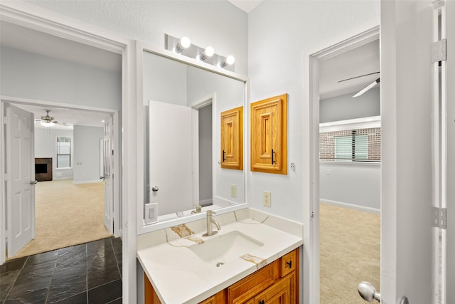 12203 Ashley Circle Dr E, Houston, TX 77071 - bathroom featuring a ceiling fan, vanity, and baseboards