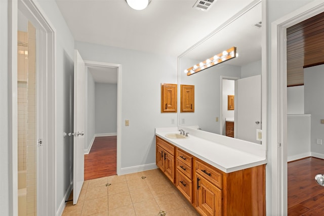 12203 Ashley Circle Dr E, Houston, TX 77071 - bathroom with vanity, baseboards, and tile patterned floors