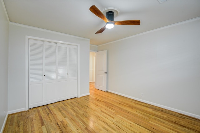 5007 Redstart St, Houston, TX 77035 - unfurnished bedroom featuring light wood-style flooring, ornamental molding, baseboards, a closet, and ceiling fan