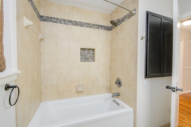 5007 Redstart St, Houston, TX 77035 - bathroom with shower / bathtub combination and wood finished floors