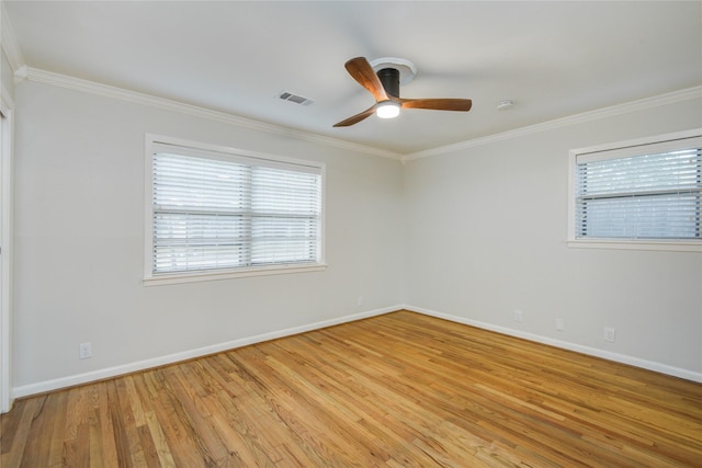 5007 Redstart St, Houston, TX 77035 - empty room with ceiling fan, crown molding, light wood finished floors, baseboards, and a smoke detector