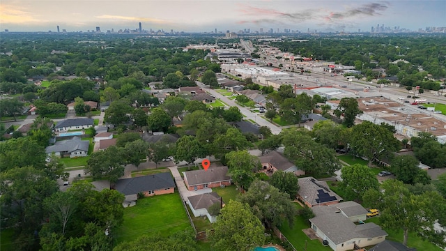 5007 Redstart St, Houston, TX 77035 - aerial overview of property's location featuring city skyline