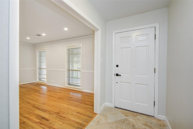 5007 Redstart St, Houston, TX 77035 - entryway with baseboards, recessed lighting, and light wood finished floors