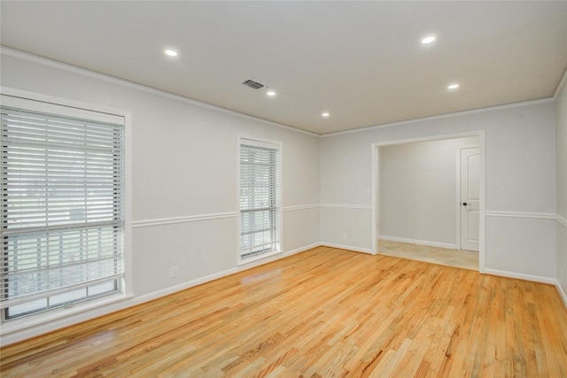 5007 Redstart St, Houston, TX 77035 - unfurnished room with ornamental molding, wood finished floors, baseboards, and recessed lighting