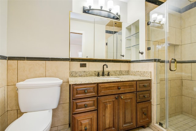 5007 Redstart St, Houston, TX 77035 - full bathroom with tile walls, vanity, toilet, and a stall shower