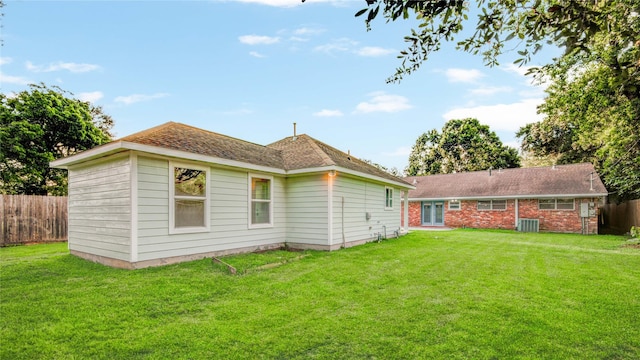 5007 Redstart St, Houston, TX 77035 - rear view of house featuring central AC