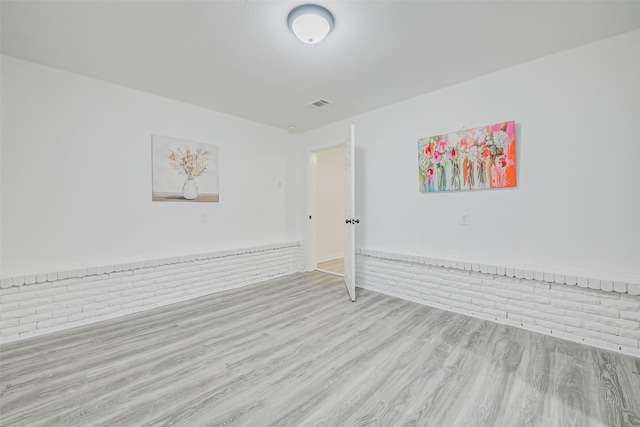 7650 US Highway 69 S, Woodville, TX 75979 - empty room with wood finished floors