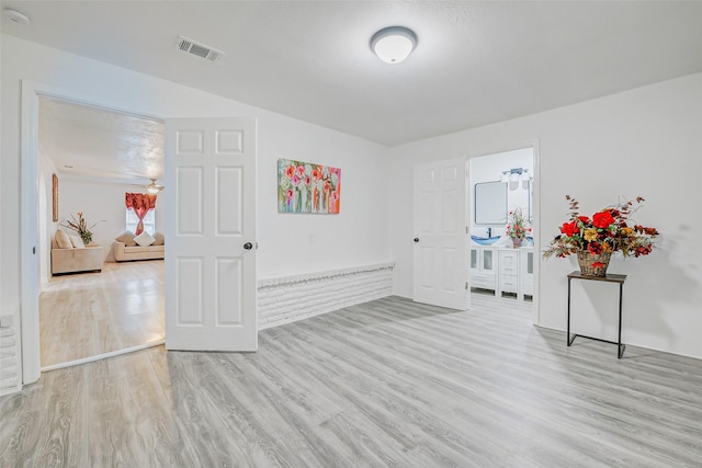 7650 US Highway 69 S, Woodville, TX 75979 - empty room with light wood-style floors