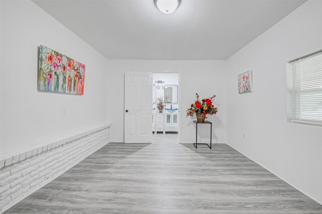 7650 US Highway 69 S, Woodville, TX 75979 - empty room with wood finished floors