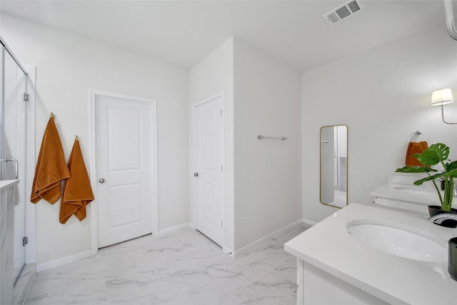 2331 Hagerman Rd, Conroe, TX 77384 - bathroom with double vanity, marble look tile flooring, a shower, and baseboards