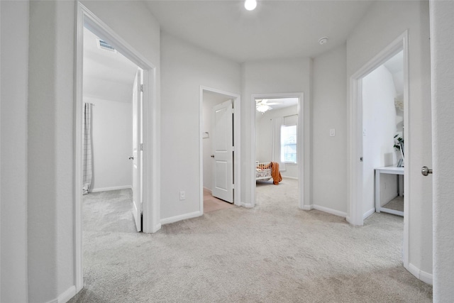 2331 Hagerman Rd, Conroe, TX 77384 - hall featuring carpet floors and baseboards
