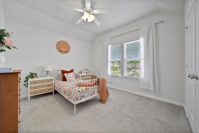 2331 Hagerman Rd, Conroe, TX 77384 - carpeted bedroom featuring lofted ceiling, baseboards, and ceiling fan
