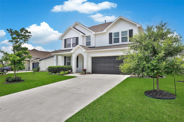 2331 Hagerman Rd, Conroe, TX 77384 - traditional-style home with a shingled roof, concrete driveway, a garage, and a front lawn