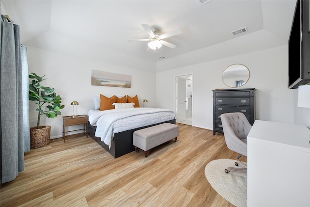 2331 Hagerman Rd, Conroe, TX 77384 - bedroom featuring light wood-style flooring, a ceiling fan, and baseboards