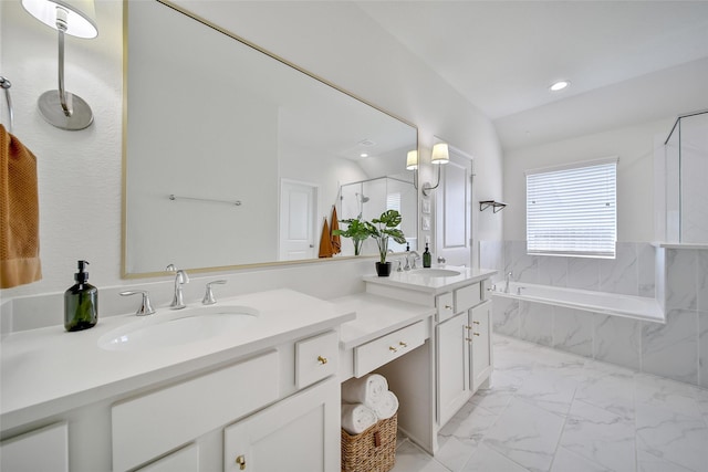 2331 Hagerman Rd, Conroe, TX 77384 - bathroom featuring a bath, double vanity, marble finish flooring, a shower stall, and recessed lighting