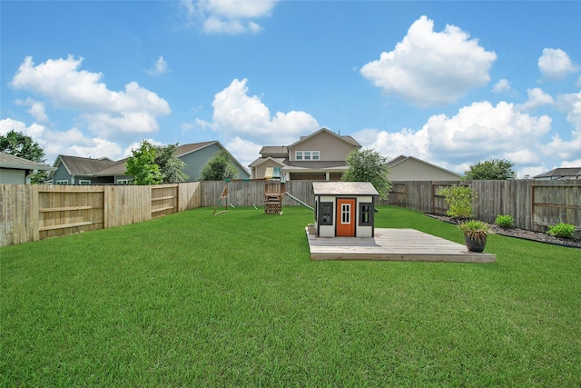 2331 Hagerman Rd, Conroe, TX 77384 - view of yard with a deck and a playground