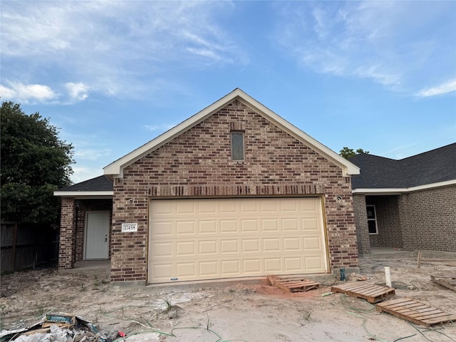 17458 Wigeon Way Dr, Humble, TX 77396 - ranch-style house with brick siding and a garage