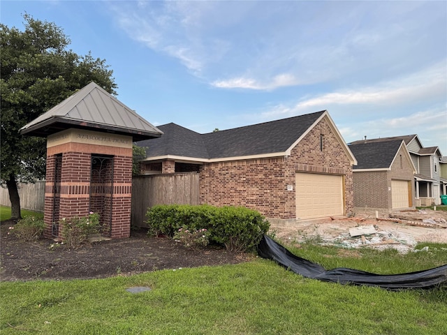 17458 Wigeon Way Dr, Humble, TX 77396 - view of front facade with brick siding, a garage, and roof with shingles