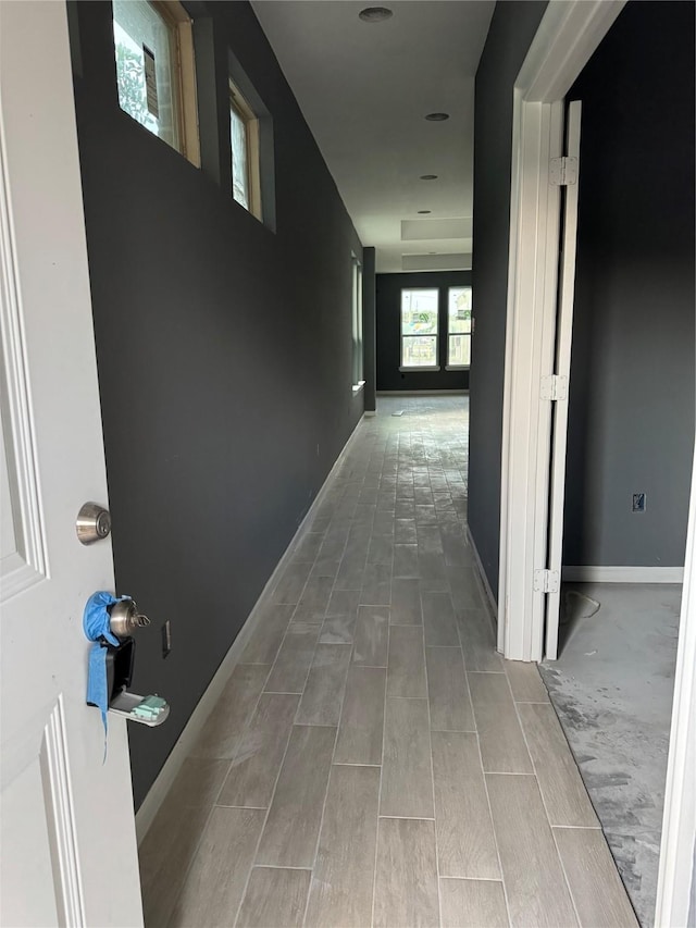 17458 Wigeon Way Dr, Humble, TX 77396 - corridor featuring wood finish floors and baseboards