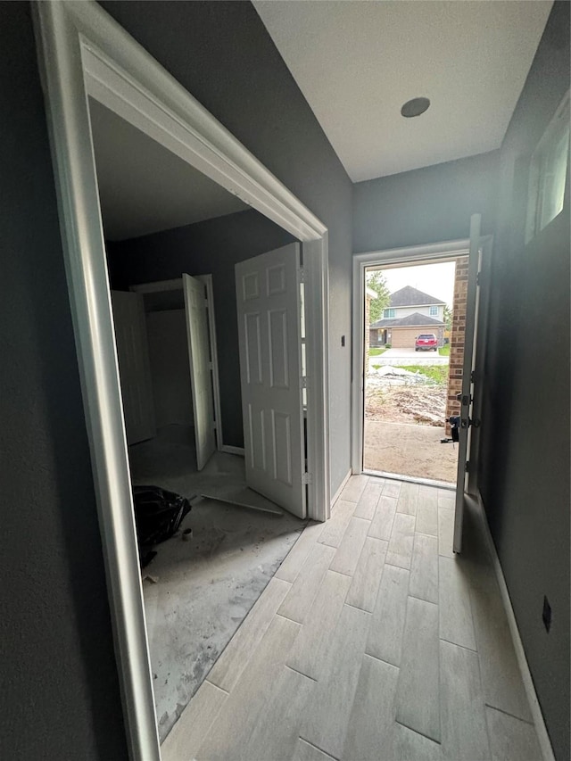 17458 Wigeon Way Dr, Humble, TX 77396 - foyer entrance featuring light wood-style floors and baseboards