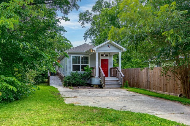 4403 2nd St, Bacliff, TX 77518 - view of front of house with a shingled roof