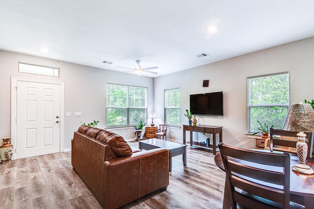 4403 2nd St, Bacliff, TX 77518 - living room with wood finished floors and ceiling fan
