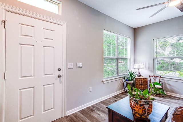4403 2nd St, Bacliff, TX 77518 - foyer entrance with a ceiling fan, wood finished floors, and baseboards