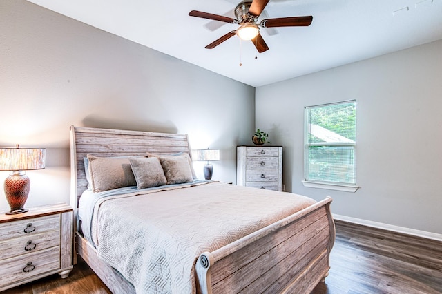 4403 2nd St, Bacliff, TX 77518 - bedroom with baseboards, dark wood finished floors, and a ceiling fan