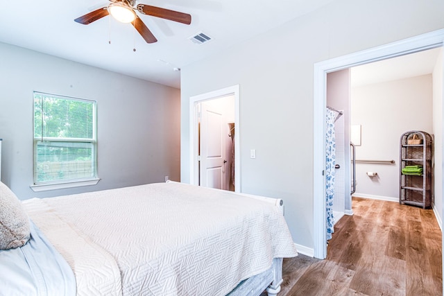 4403 2nd St, Bacliff, TX 77518 - bedroom with wood finished floors, baseboards, and ceiling fan