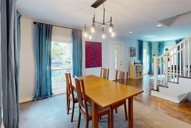 2737 Werlein Ave, Houston, TX 77005 - dining room with a chandelier, stairs, recessed lighting, wood finished floors, and baseboards