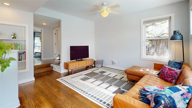 2737 Werlein Ave, Houston, TX 77005 - living area with plenty of natural light, wood finished floors, built in features, recessed lighting, and a ceiling fan