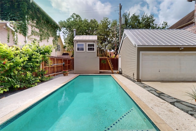 2737 Werlein Ave, Houston, TX 77005 - view of pool with an outdoor structure and a fenced backyard