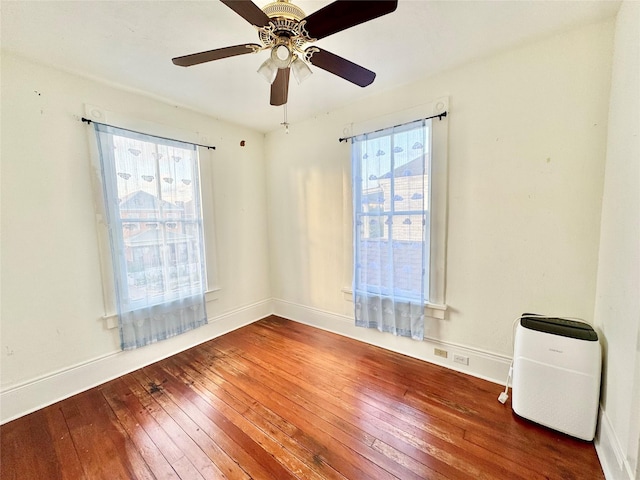 1317 Church St, Galveston, TX 77550 - unfurnished room featuring hardwood / wood-style floors, plenty of natural light, and baseboards