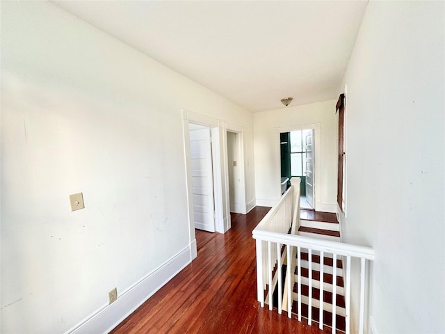 1317 Church St, Galveston, TX 77550 - corridor featuring wood finished floors, baseboards, and an upstairs landing