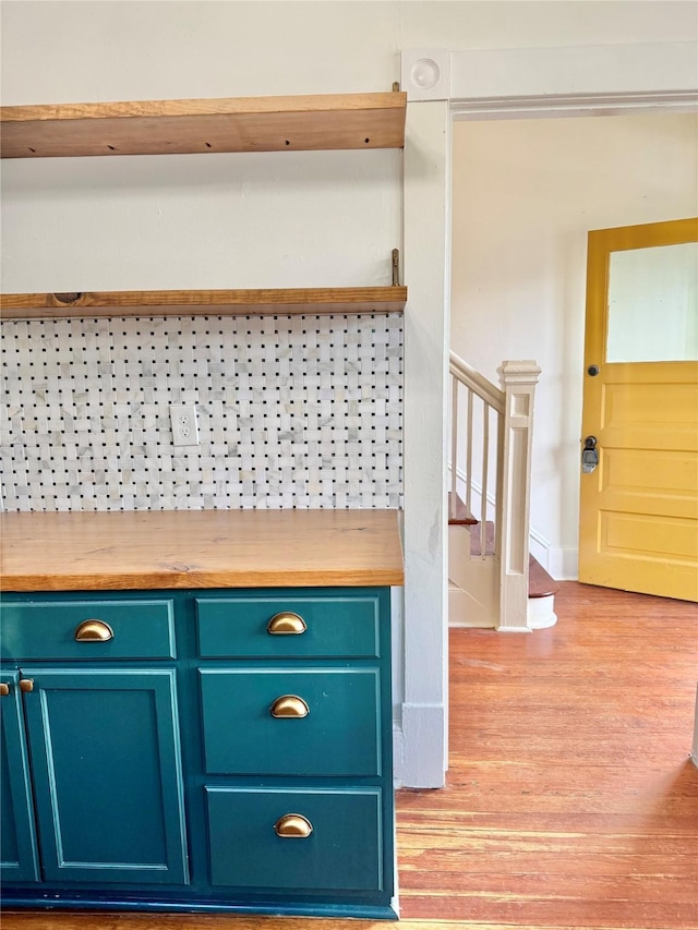 1317 Church St, Galveston, TX 77550 - detailed view of wood finished floors and baseboards
