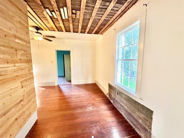 1317 Church St, Galveston, TX 77550 - spare room featuring plenty of natural light, hardwood / wood-style flooring, and ceiling fan