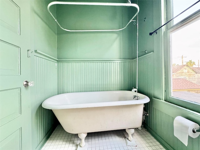 1317 Church St, Galveston, TX 77550 - full bathroom featuring plenty of natural light and a freestanding tub