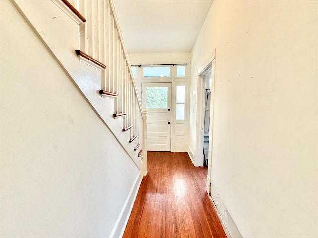 1317 Church St, Galveston, TX 77550 - entryway with hardwood / wood-style flooring, stairs, and baseboards