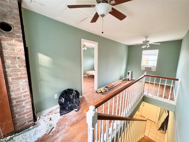 1317 Church St, Galveston, TX 77550 - stairs featuring a ceiling fan, wood finished floors, and attic access