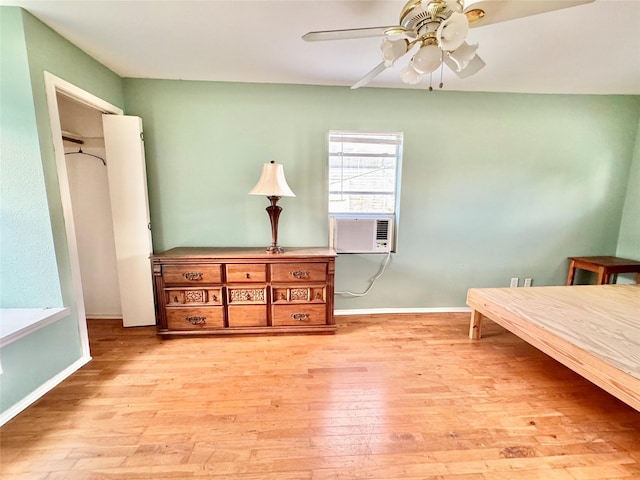 1317 Church St, Galveston, TX 77550 - bedroom featuring hardwood / wood-style flooring, baseboards, a ceiling fan, and cooling unit