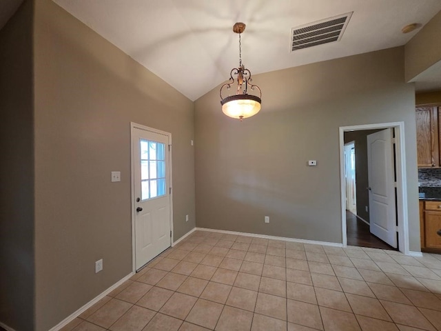 19518 Grand Colony Ct, Katy, TX 77449 - entrance foyer with lofted ceiling, light tile patterned floors, and baseboards