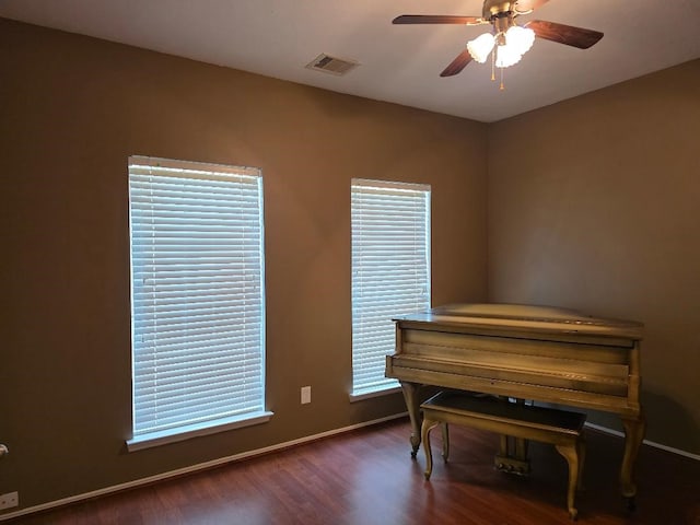 19518 Grand Colony Ct, Katy, TX 77449 - living area with wood finished floors, ceiling fan, and baseboards