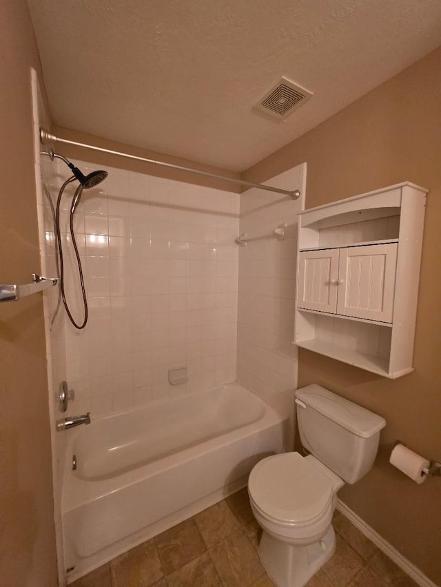 19518 Grand Colony Ct, Katy, TX 77449 - full bath featuring toilet, shower / washtub combination, baseboards, and a textured ceiling