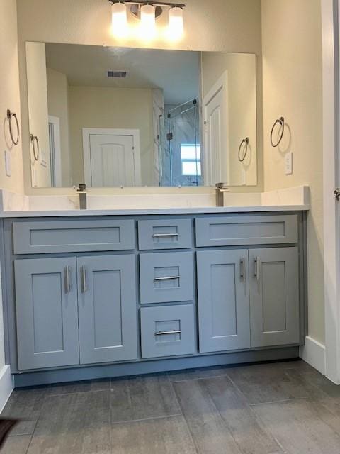 10516 Exeter St, Houston, TX 77093 - full bathroom featuring double vanity and a stall shower