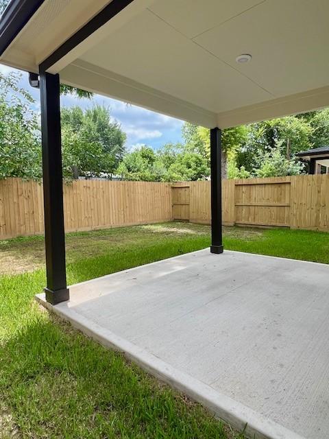 10516 Exeter St, Houston, TX 77093 - fenced backyard with a patio