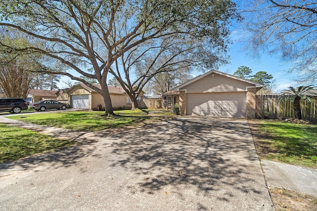 22303 Acorn Chase Dr, Spring, TX 77389 - view of front facade with concrete driveway, a garage, and brick siding