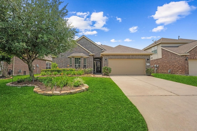 25303 Hawthorne Blossom Dr, Spring, TX 77389 - french country inspired facade featuring an attached garage, brick siding, concrete driveway, and a front lawn